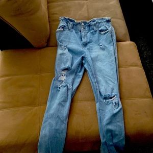 These are ripped blue jeans. The waist band is stretchy. They are size 9